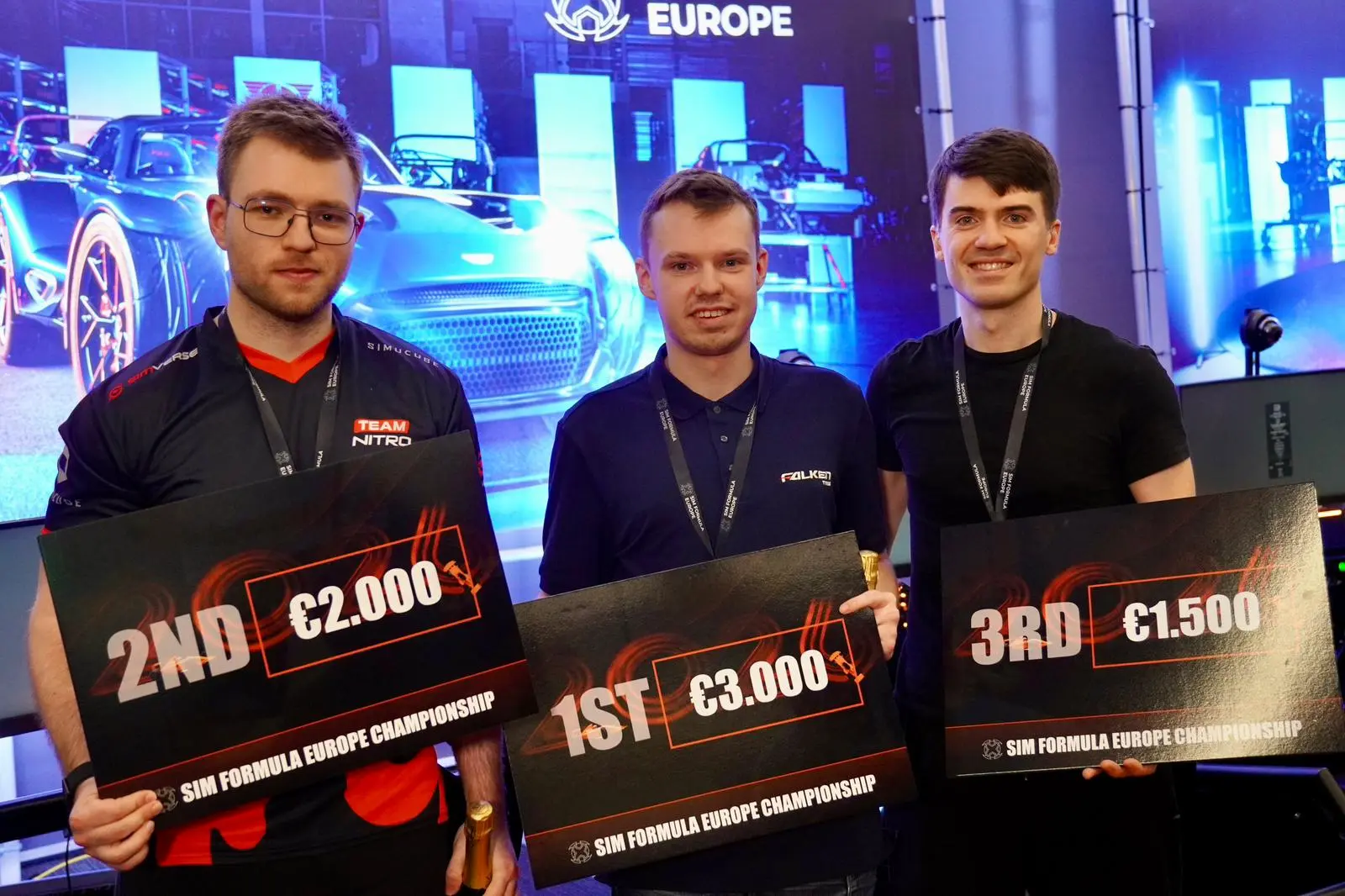 The top three of the Sim Formula Europe Championship with their cheques